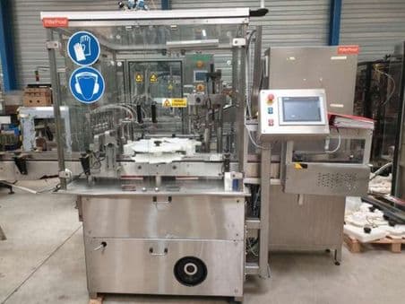 Remplisseuse boucheuse sertisseuse rotative pour flacons FARMOMAC/IMA F 57 1999 Reconditionné - Équipement professionnel d'occasion - Smart Reuse